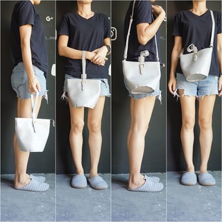 กระเป๋าหนังหิ้ว คล้องมือ มีสายcrossbody  ทรงน่ารัก ของใหม่ตำหนิจิ๊ดเดียว สินค้าจากญี่ปุ่น