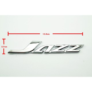 1ชิ้นป้ายโลโก้ JAZZ ชุบโครเมี่ยมขนาด15.0x2.7cm สำหรับรถ HONDA JAZZ ด้านหลังติดด้วยเทปกาวสองหน้า