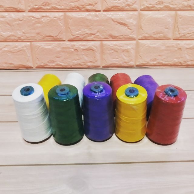 ด้ายเย็บกระสอบ ด้ายจักรเย็บกระสอบ คละสีได้ (167กรัม/ม้วน)