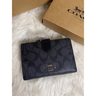 COACH Medium corner zip wallet