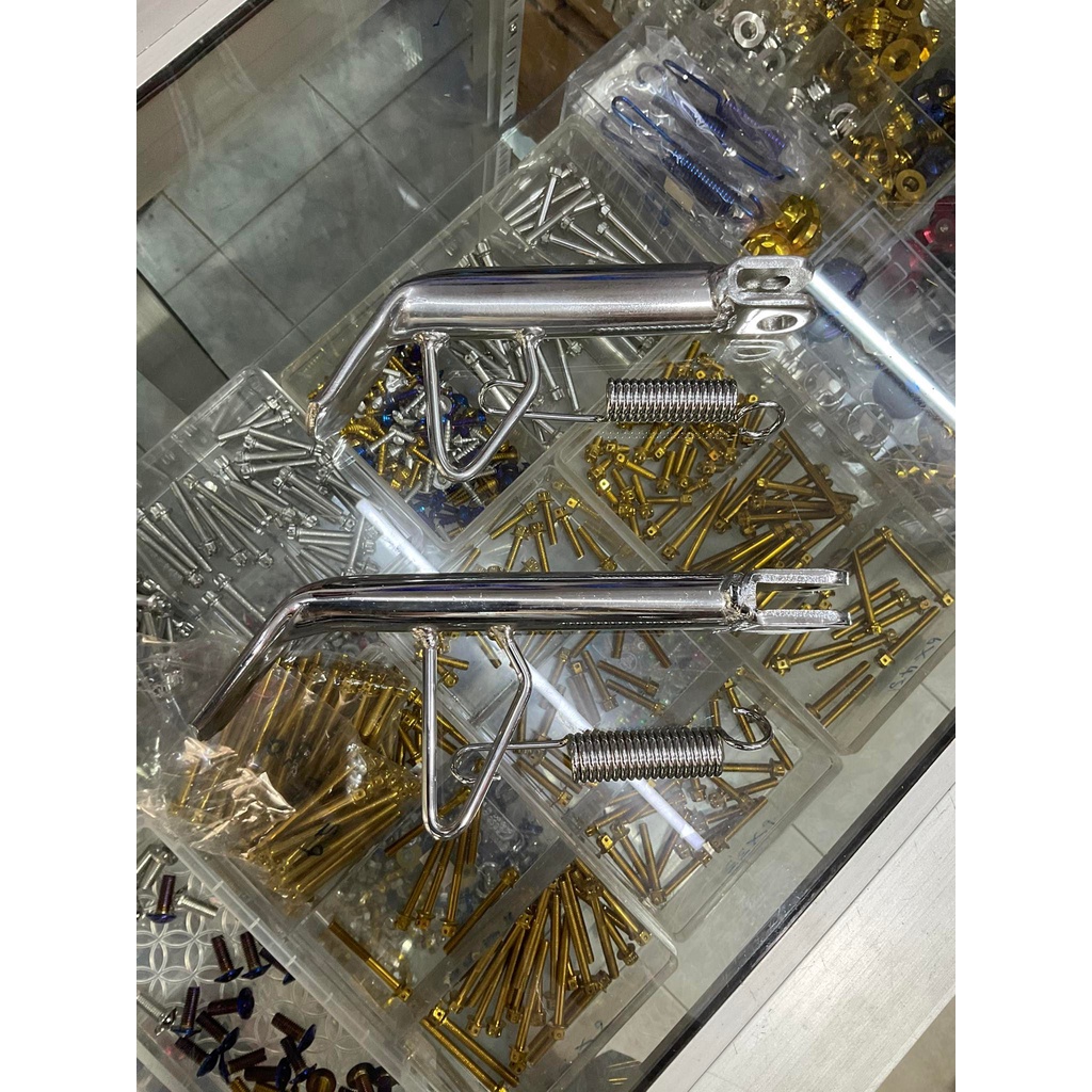 ขาตั้งข้าง ชุบเงาหนาพิเศษ(แถมสปริง)ใส่ ฮอนด้า โนวา เทน่า สมาย เวฟ100-125  ผลิตจากวัสดุเหล็กหนาพิเศษแข็งแรงงานสวย