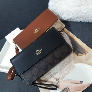 คลัทช์คล้องมือ COACH 78229 FOLDOVER WRISTLET IN SIGNATURE CANVAS