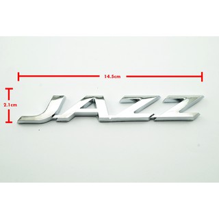 1ชิ้นป้ายโลโก้ JAZZ ชุบโครเมี่ยมขนาด14.5x2.1cm สำหรับรถ HONDA JAZZ ด้านหลังติดด้วยเทปกาวสองหน้า