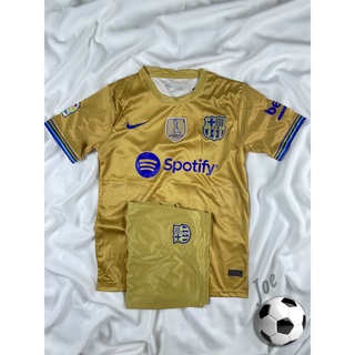 ชุดบอล Barcelona (Gold) เสื้อบอลและกางเกงบอลผู้ชาย ปี 2022-2023 ใหม่ล่าสุด