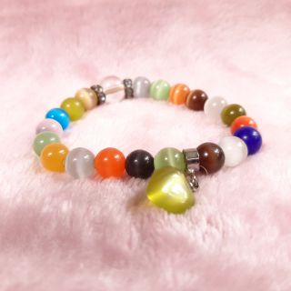 กำไลหินนำโชคกรีนฮาร์ทสโตนLucky cat eye stone with green heart stone bracelet