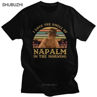 เสื้อยืดผ้าฝ้ายพิมพ์ลายขายดี เสื้อยืดแขนสั้น ผ้าฝ้าย พิมพ์ลาย I Love The Smell Of Napalm In The Morning สไตล์วินเทจ สําห