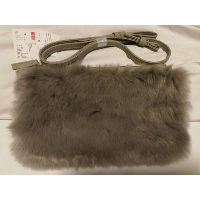 ยูนิโคล่ uniqlo กระเป๋าถือ คลัทช์ ใส่สายยาวสะพายเพิ่มได้