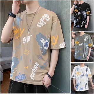 ✨COD M-3XL✨เสื้อยืดสไตล์เกาหลีชาย เสื้อยืดคอกลมแขนสั้นพิมพ์ลายการ์ตูนกราฟฟิตี้ เสื้อยืดแฟชั่นลำลอง ใส่สบายมาก ขายดีสไตล์เกาหลี