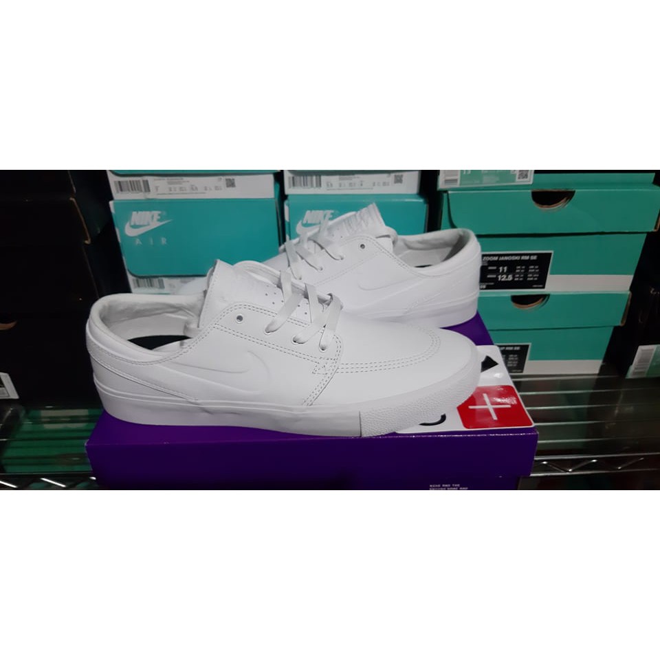 nike janoski triple white