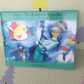 Meo -The  Rainbow  Traveller and his Adventures through Turquoise  by Kheli Italiano(ปกแข็ง)มือสอง -cb3