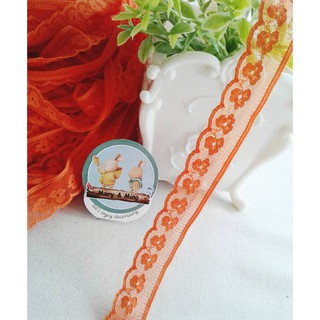 ลูกไม้โปร่ง ไม่ยืด ลายดอกไม้ สีส้ม กว้าง 18 มิล ราคา 1 หลา 10 บาท