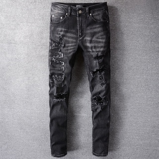 AMIRI new LOGO patch black ripped jeans