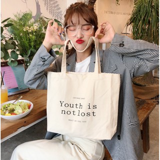 Runpee-  J023 กระเป๋าผ้า  Youth is not lost  A4มีก้น ลายอักษรใบใหญ่จ้าาา  🍉🧡 มีช่องด้านใน  จ้าาาาาาาา