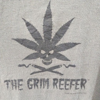 New 🆓 ส่งฟรีไม่ต้องใช้โค้ด เสื้อยืดมือสอง Usa THE GEIM REEFER ™ ปี2005 Size M.อก20/ยาว26