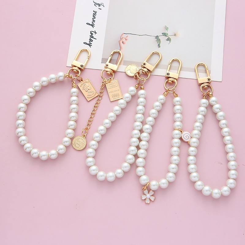 [พร้อมส่ง] พวงกุญแจห้อยกระเป๋าไข่มุก คล้องแขนได้ งานสวยดูแพง มี 4 แบบให้เลือก