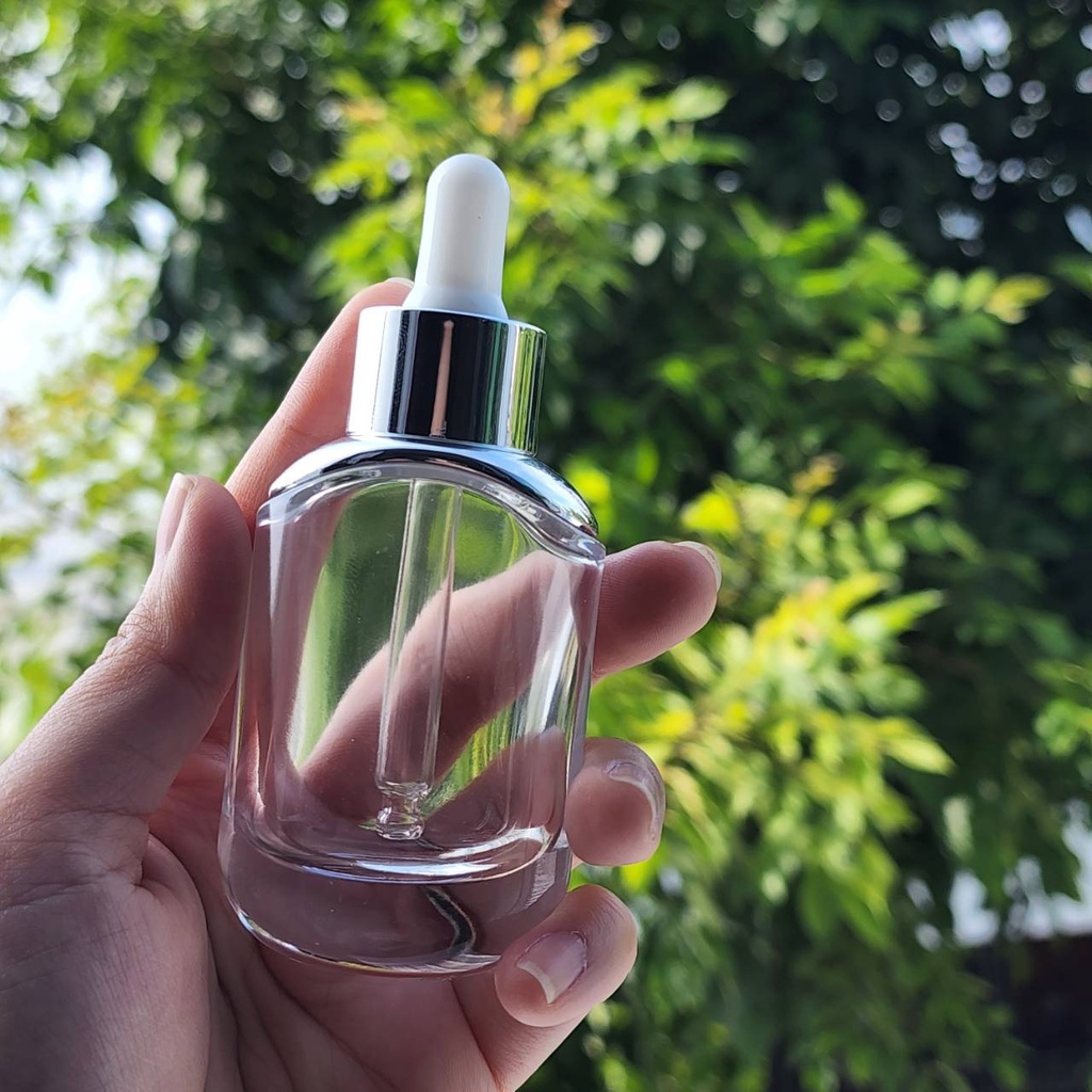 ขวดแก้วดรอปเปอร์สีใส 30ml. ทรง Dior (ไหล่เงิน) ฝาเงินจุกขาว งานเค้าท์เตอร์ หนา แข็งแรง ทรงรี หน้ากว้าง ดูดีสุดๆ