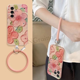 พร้อมส่ง เคสโทรศัพท์มือถือ ซิลิโคนนิ่ม TPU กันตก ป้องกันเลนส์กล้อง ลายดอกไม้ ประดับพลอยเทียม แสงสีฟ้า พร้อมสายรัดข้อมือ สําหรับ Samsung Galaxy A34 A54 5G