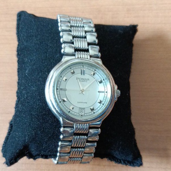 นาฬิกาแบรนด์เนมPOMARหน้าปัดสีเงินช่วงวันที่ สายสแตนเลสสีเงินของแท้มือสองสภาพสวย