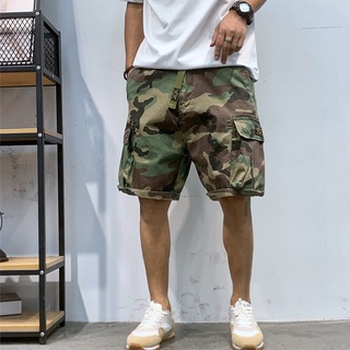 Ⓢ Camo Cargo Shorts : กางเกงขาสั้นลายพราง มีกระเป๋าด้านข้าง ทรงขากระบอกใหญ่ สะโพกใหญ่ ความยาวประมาณกลางเข่า