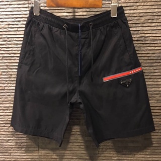 กางเกงขาสั้นเอวยางยืด PRADA RE-NYLON SHORT  ผ้าใส่สบาย Size M / XL ถ่ายสดจากสินค้าจริง100%