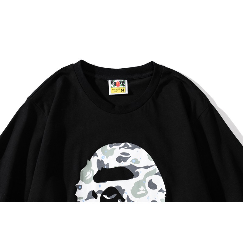 Bape เสื้อยืดแขนสั้น พิมพ์ลายตัวอักษร Ape Shark Camo เรืองแสง สีขาว สีดํา สําหรับผู้ชาย และผู้หญิง