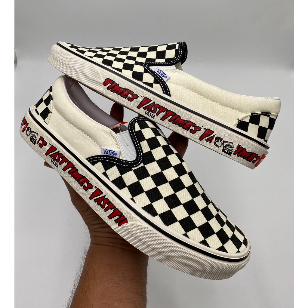 vans slip on checkerboard fast times