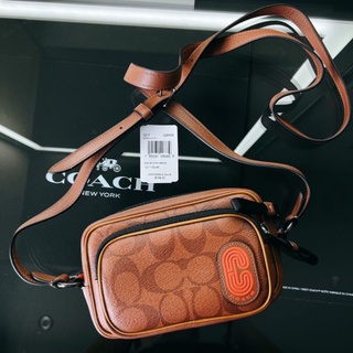 กระเป๋าสะพายชาย COACH MINI EDGE DOUBLE POUCH CROSSBODY IN SIGNATURE CANVAS