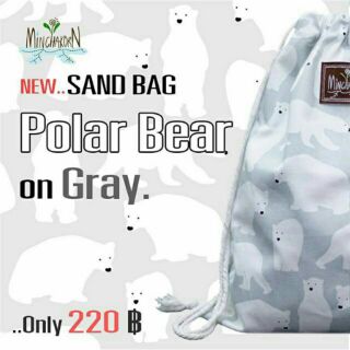 Polar Bear On Gray Sand Bag