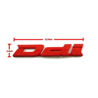 ป้ายโลโก้ ISUZU Ddi พลาสติกสีแดง ขนาด 12.0X2.5 cm ติดตั้งด้วยเทปกาวสองหน้าด้านหลัง