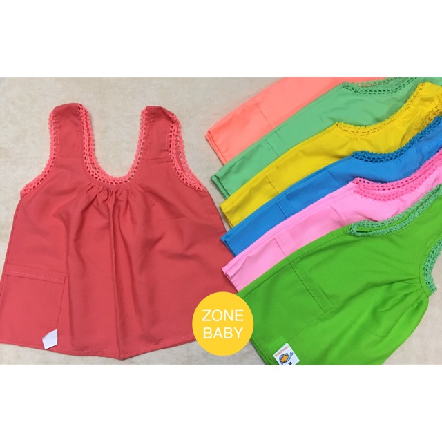 เสื้อคอกระเช้าเด็ก เสื้อคอกระเช้า เนื้อผ้าดีมากก มีกระเป๋า สีสดใส มีหลายสี เหมาะกับอากาศร้อนๆใส่ได้สบายๆเลยจ้า