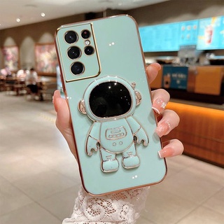 เคสโทรศัพท์มือถือ TPU นิ่ม ปิดด้านหลัง ขอบสี่เหลี่ยม ลายนักบินอวกาศ หรูหรา แวววาว พร้อมที่ตั้งวาง สําหรับ Samsung Galaxy S22 Ultra Plus S21 FE Ultra Plus S21