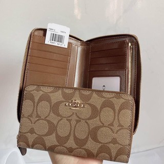 MEDIUM ZIP AROUND WALLET IN SIGNATURE CANVAS (COACH F88913)