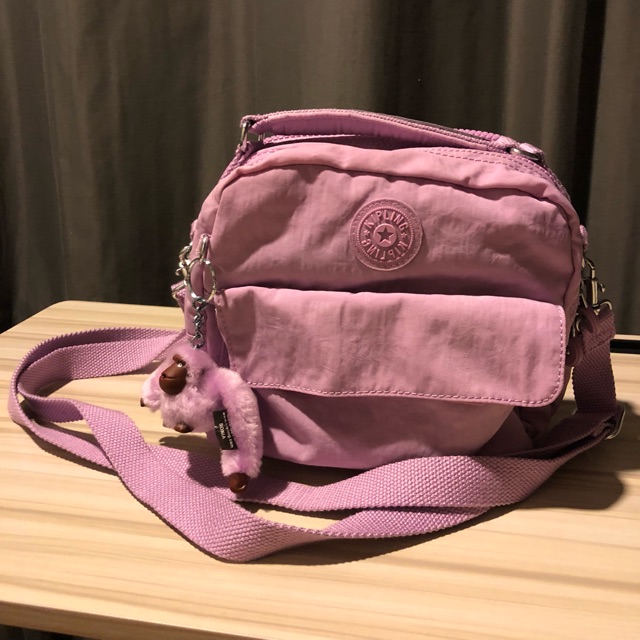 กระเป๋าสะพายใบเล็ก Kipling สีม่วงพาสเทล