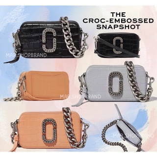 THE CROC-EMBOSSED SNAPSHOT