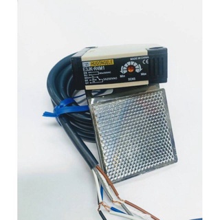 E3JK-R4M1 VOLTS 12-24vdc เซ็นเซอร์จับวัตถุทั่วไประยะจับ4เมตรใช้กับแผ่นสะท้อนไปกลับ