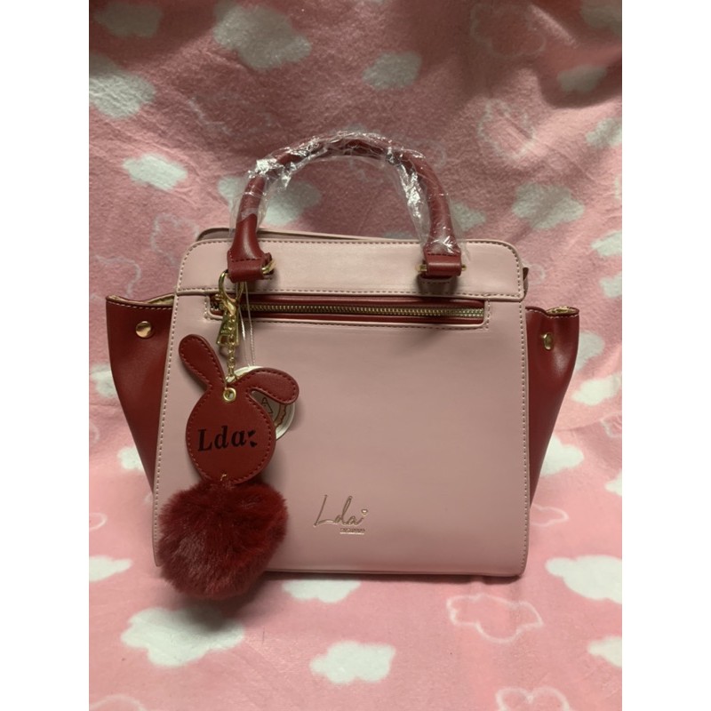 กระเป๋าสะพายLdaสีชมพู