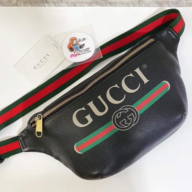 Used in good condition Gucci Print leather belt bag