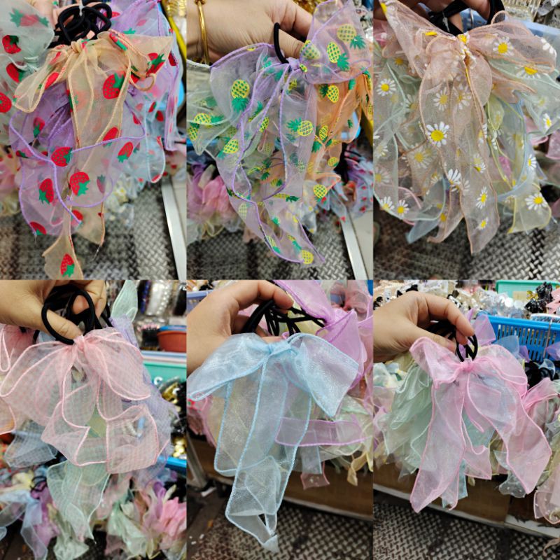 ยางมัดทรงโบว์...มีหลายลายคละสีค่ะ 1มัดมี10เส้นค่ะ