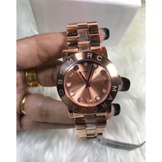 MBM3216 Rose gold-tone stainless steel case and bracelet. Fixed rose gold-tone bezel. Rose gold