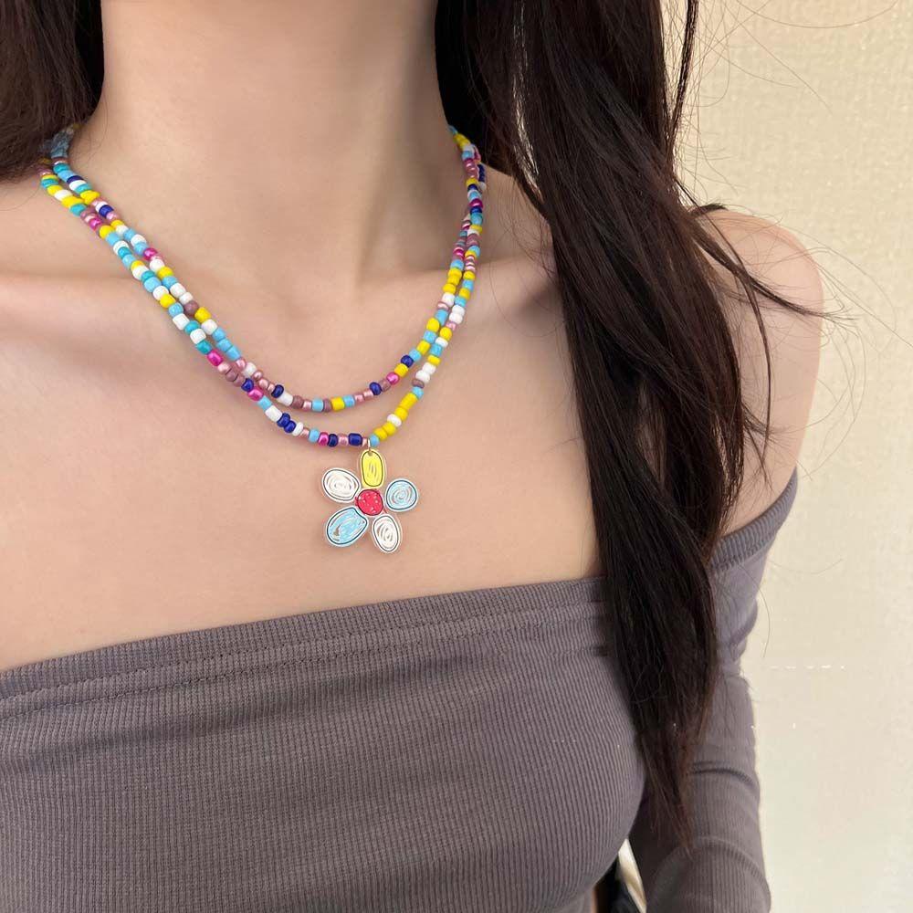 Ivory บุคลิกภาพ ผู้หญิง สร้อยคอ วินเทจ ที่มีสีสัน ลูกปัดข้าว สร้อยคอโบฮีเมียน ผีเสื้อ แฟชั่น สไตล์ชนเผ่า สไตล์เกาหลี สร้อยคอลูกปัดสองชั้น เครื่องประดับชายหาด