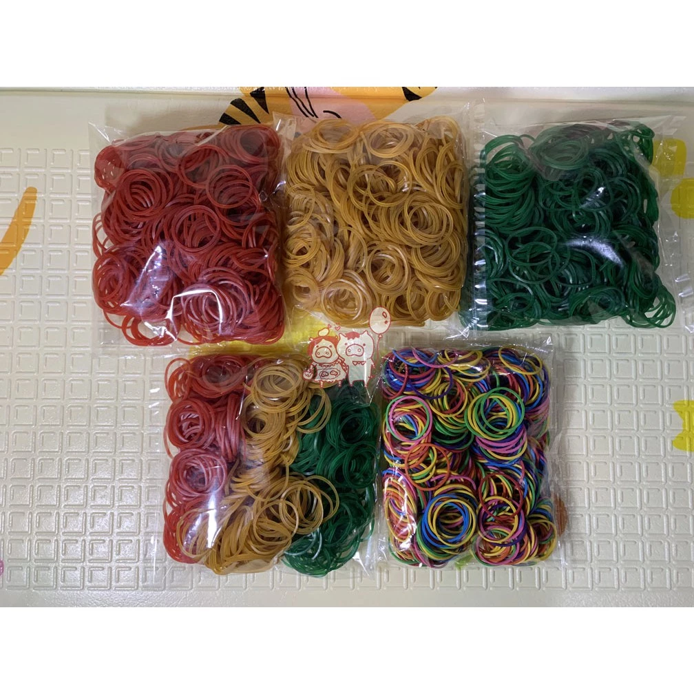 แบ่งขายถุงละ 100 กรัม หนังยางรัดแกง วงเล็ก / วงใหญ่ / สีสันสดใส อย่างดี ตรา KW