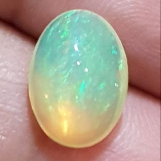 โอปอลธรรมชาติแท้เนื้อสวย 8x11x5mm (Natural rainbow opal)