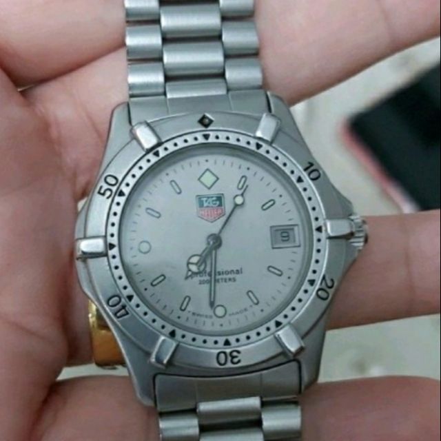 นาฬิกา Tag Heuer Series 2000 ขนาด
34 มม. หน้าสีบรอนซ์เงิน