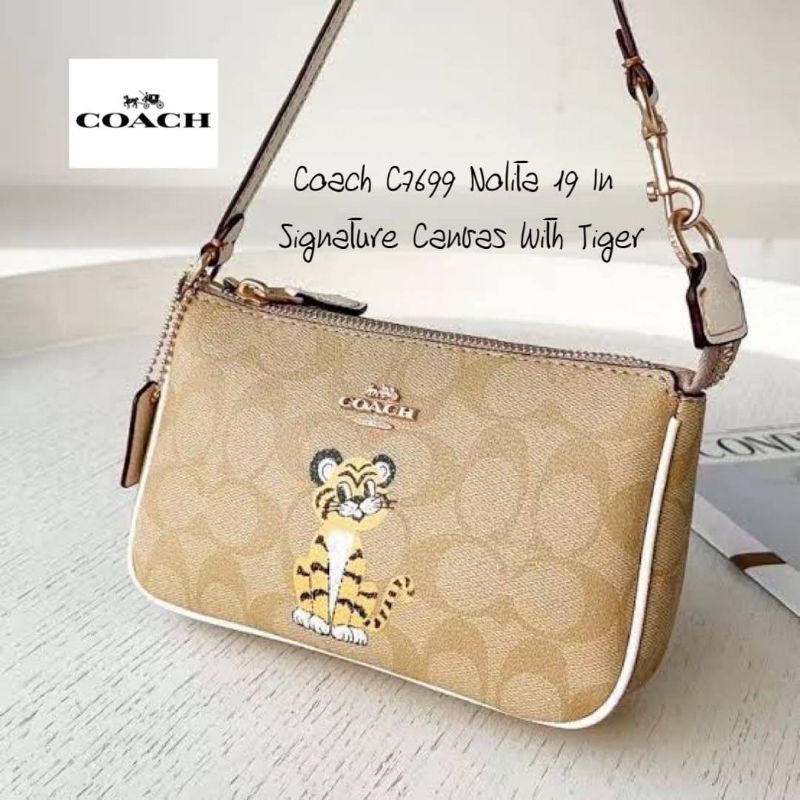 กระเป๋าสะพายมินิลายเสือ 2022 Coach C7699 Nolita 19 In Signature Canvas With Tiger 001