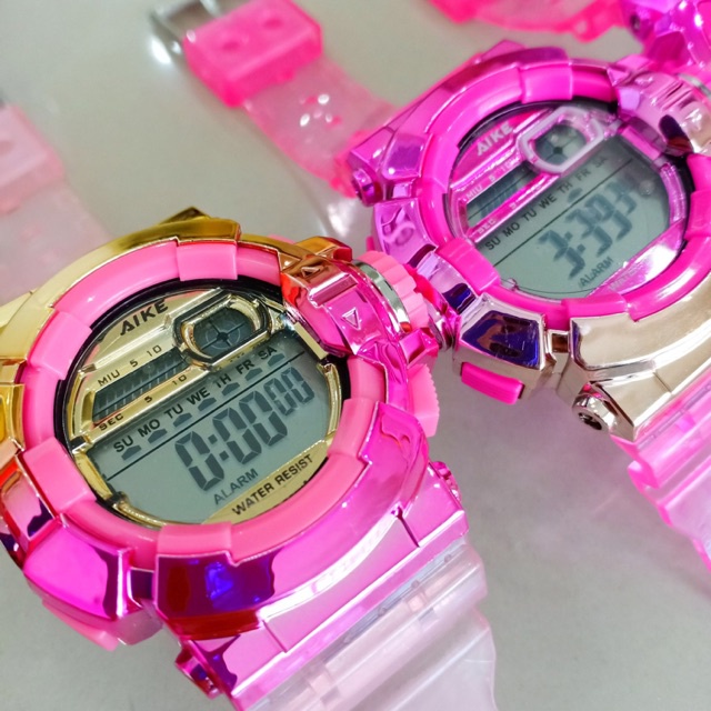 MK นาฬิกาดิจิตอล AIKE รุ่นสีชมพูเมทาริค สายใส นาฬิกาสำหรับผู้หญิง จับเวลา ตั้งปลุก มีไฟ สีสันสดใส วัยรุ่นชอบ ราคาพิเศษ 1