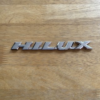 โลโก้ HILUX ตัวหนังสือฝาท้าย ตัวหนังสือข้างประตู ขนาด 16.3x1.6cm