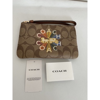 Coach Corner Zip Wristlet In Signature Canvas With Coach Radial Rainbow (Size S)