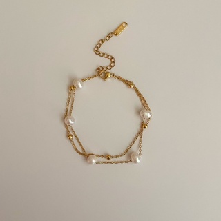 Shellnadgold - สร้อยข้อมือมุกน้ำจืดแท้กับอะไหล่ทอง มาพร้อมกับสร้อยแบบตุ้มอะไหล่ทอง แบบ 2 ชั้นติดกัน วัสดุเป็นสแตนเลส