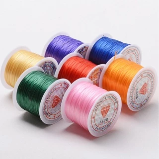 ไหมยืดญี่ปุ่นเกรดดี แบบแบน มีหลายสี สำหรับร้อยลูกปัด ร้อยหิน