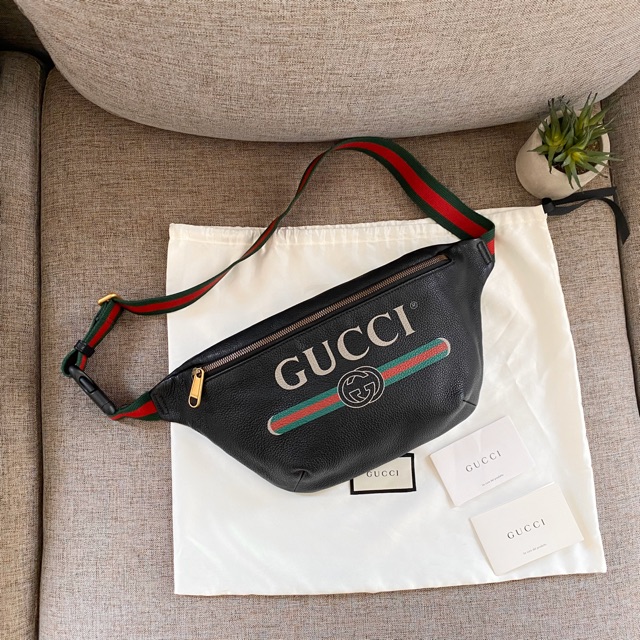 Gucci print leather belt bag